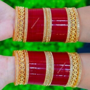 Elevate your traditional attire with our exquisite Traditional Punjabi Chura, adorned with stunning American diamonds. This beautifully crafted bangle set not only reflects the rich cultural heritage of Punjab but also adds a touch of modern elegance to your look. Each piece is meticulously designed to ensure durability and comfort, making it perfect for weddings, festivals, or any special occasion. Embrace the charm of tradition while showcasing your unique style with this captivating accessory that is sure to turn heads.