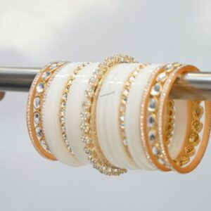 Elevate your bridal look with our exquisite Punjabi Bridal Chura, a traditional symbol of love and prosperity.