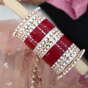 Punjabi Chura Design With Dotted Bangles In Maroon Color