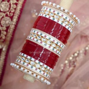 Punjabi Chura Design With Dotted Bangles In Maroon Color