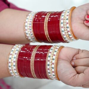Punjabi Maroon chura With Dotted And Kundan Bangles